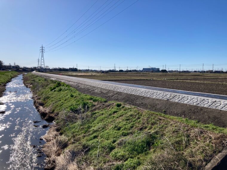 社資(河川)工事(新江川天端舗装工その2)